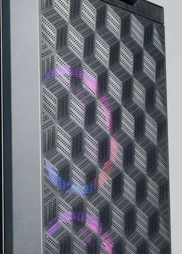 Original photograph of the dotted geometric ventilation stamped into a PC chassis.