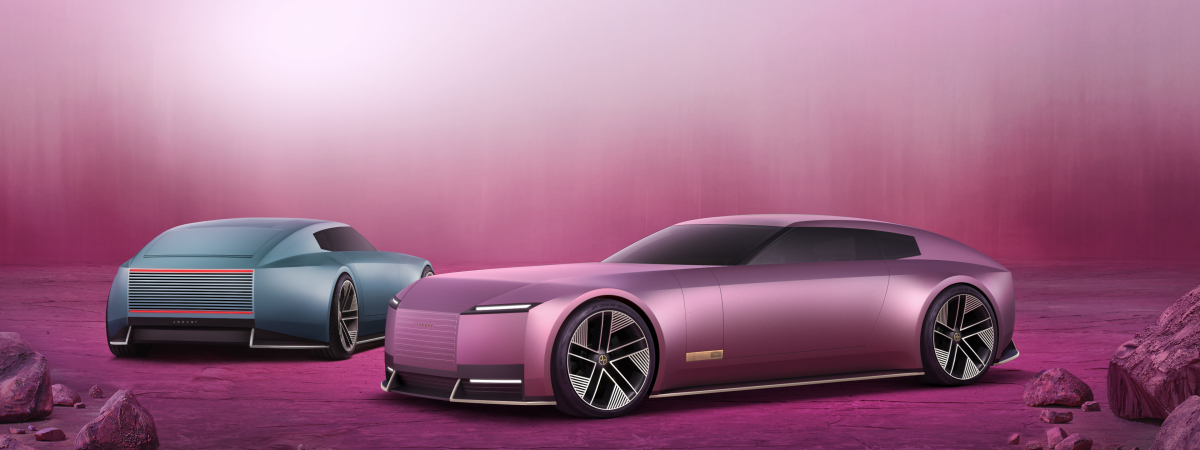 Pink and blue Jaguar Type 00 concept cars, showing the front and long side profile.
